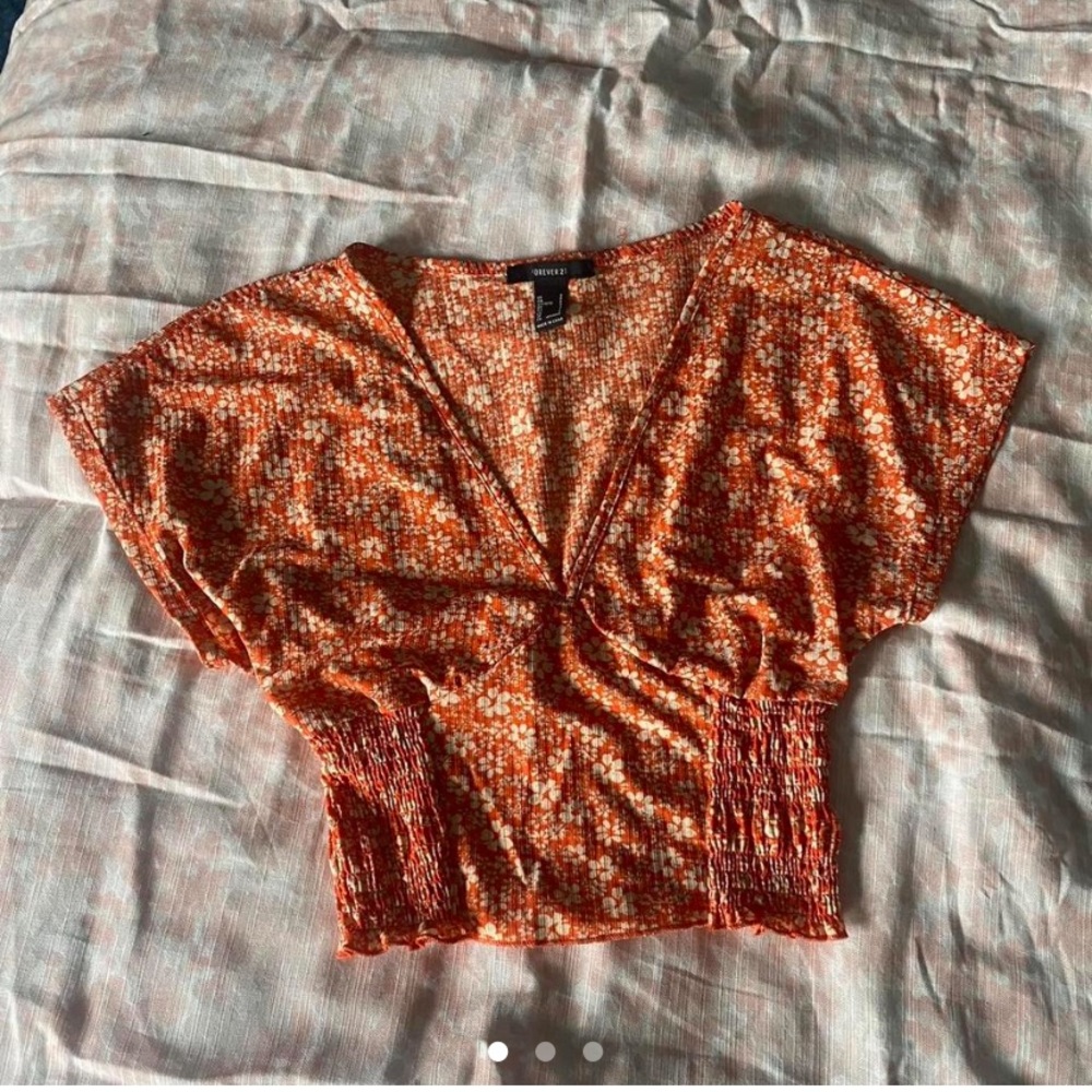 Floral orange crop top